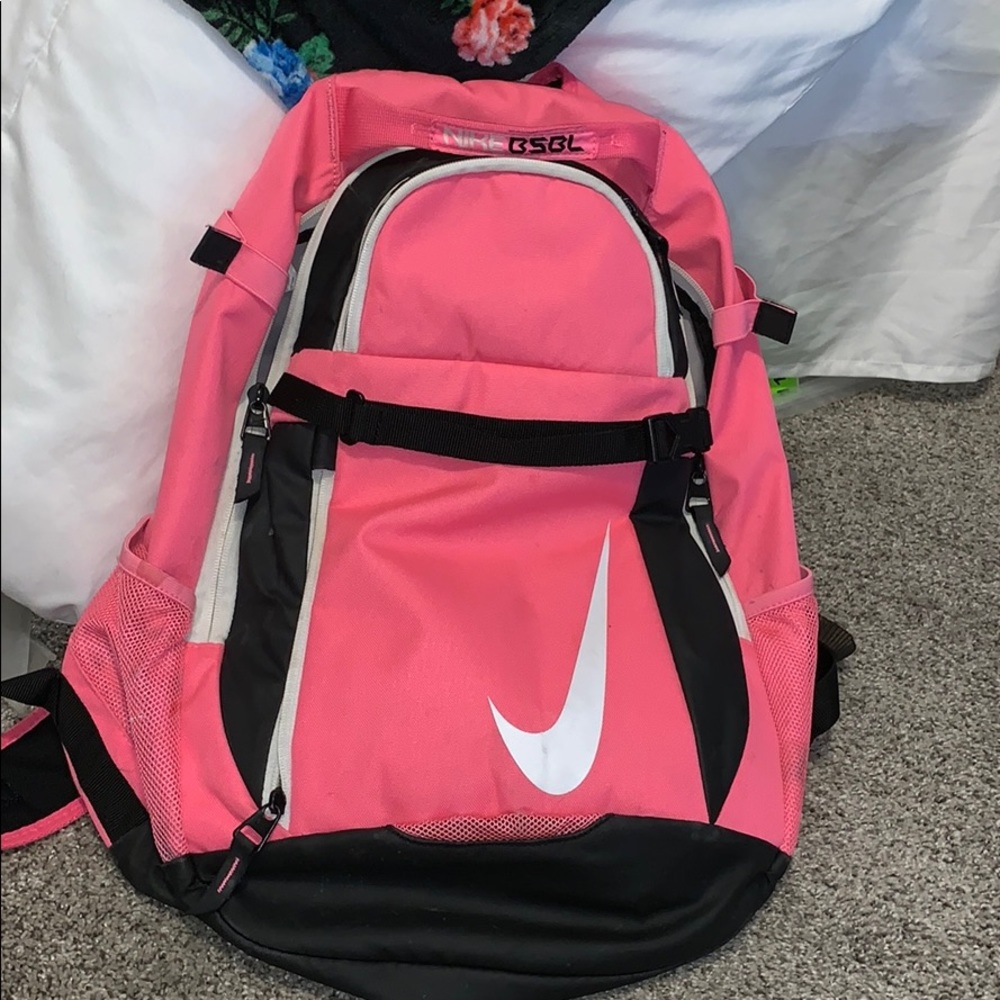 Pink, white, black Nike backpack.